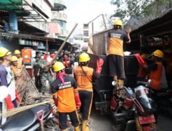 Kodim 1408/Makassar Tunjukkan Kepedulian Lingkungan Lewat Karya Bakti di Pasar Terong